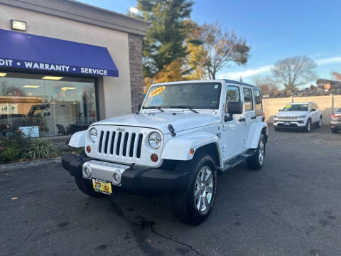 2013 Jeep Wrangler Unlimited for sale at CARMART ONE LLC in Freeport NY
